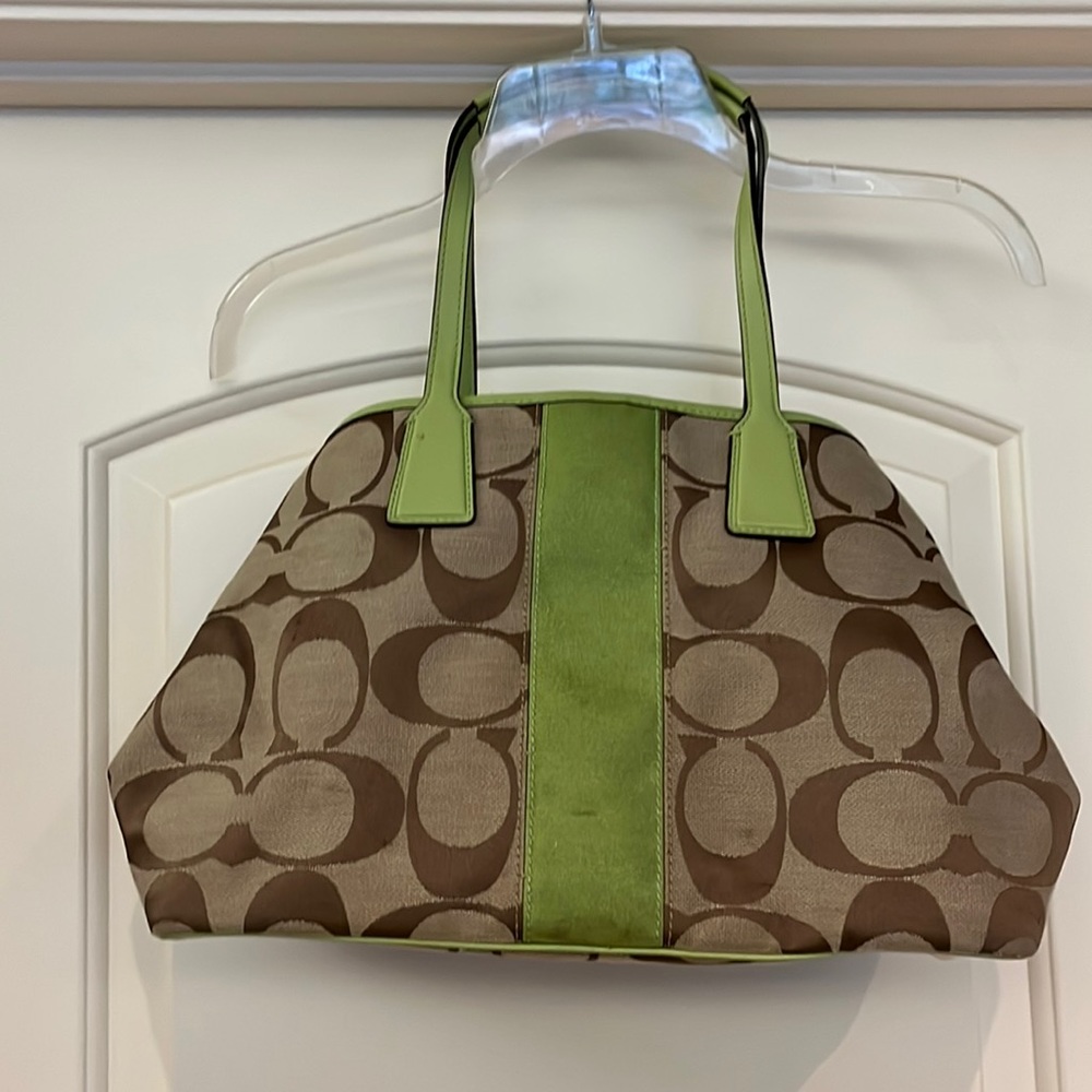 Coach purse with accent color green